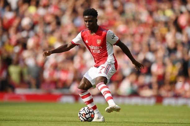 Bukayo Saka of Arsenal in action during the Premier League match between Arsenal and Chelsea at Emirates Stadium on August 22, 2021 in London,...