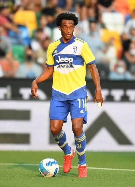 Juan Quadrado of Juventus in action during the Serie A match between Udinese Calcio v Juventus at Dacia Arena on August 22, 2021 in Udine, Italy.