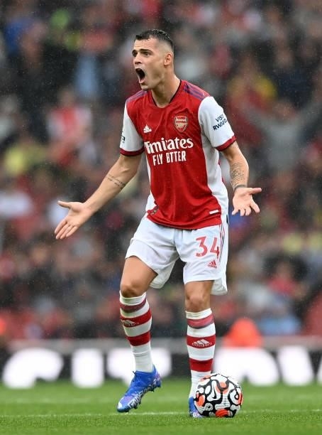 Granit Xhaka of Arsenal reacts during the Premier League match between Arsenal and Chelsea at Emirates Stadium on August 22, 2021 in London, England.