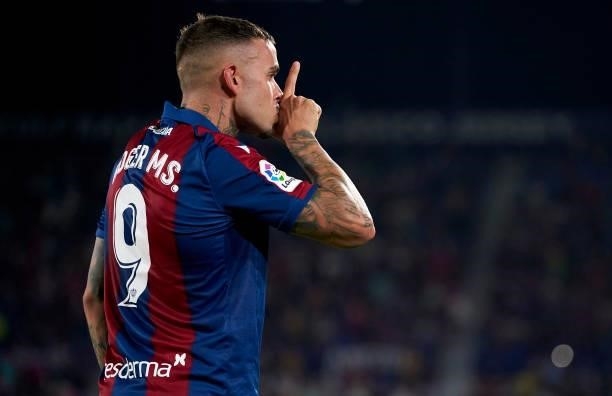 Roger Marti of Levante UD celebrates after scoring his team's first goal during the La Liga Santander match between Levante UD and Real Madrid CF at...