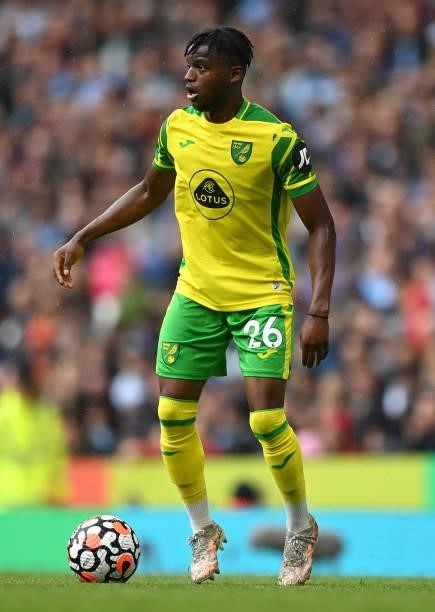 Bali Mumba of Norwich City runs with the ball during the Premier League match between Manchester City and Norwich City at Etihad Stadium on August...