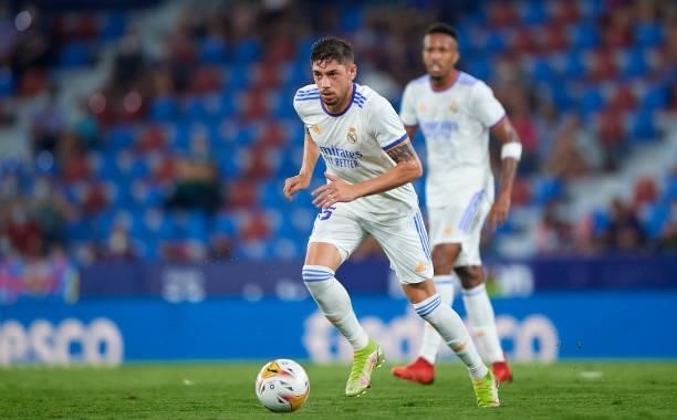 Fede Valverde of Real Madrid CF runs with the ball during the La Liga Santander match between Levante UD and Real Madrid CF at Ciutat de Valencia...
