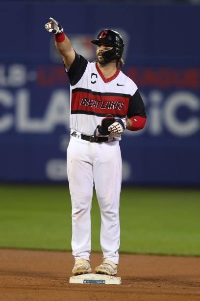 Austin Hedges of the Cleveland Indians celebrates a double against the Los Angeles Angels in the 2021 Little League Classic at Bowman Field on August...