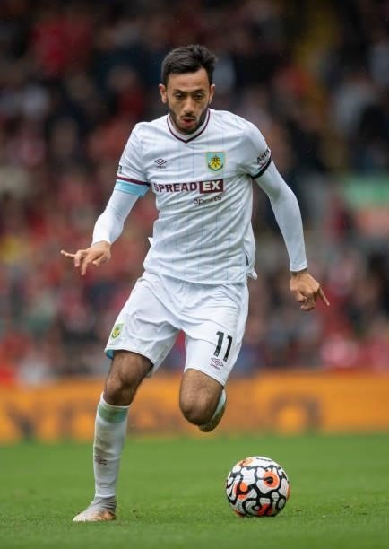 Dwight McNeil of Burnley on action during the Premier League match between Liverpool and Burnley at Anfield on August 21, 2021 in Liverpool, England.