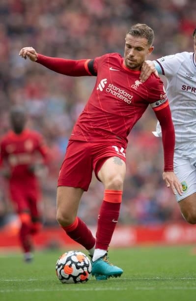 Jordan Henderson of Liverpool in action during the Premier League match between Liverpool and Burnley at Anfield on August 21, 2021 in Liverpool,...