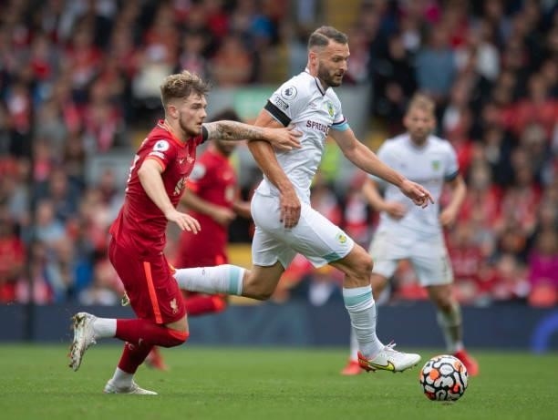 Erik Pieters of Burnley and Harvey Elliott of Liverpool in action during the Premier League match between Liverpool and Burnley at Anfield on August...