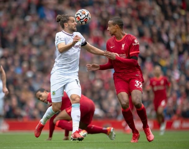 Joel Matip of Liverpool and Jay Rodriguez of Burnley in action during the Premier League match between Liverpool and Burnley at Anfield on August 21,...