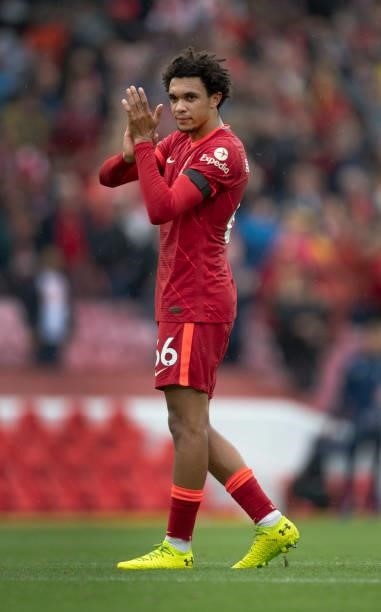 Trent Alexander-Arnold of Liverpool applauds the fans after the Premier League match between Liverpool and Burnley at Anfield on August 21, 2021 in...