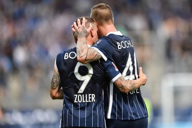 Sebastian Polter and Simon Zoller of VfL Bochum celebrate after scoring a goal that is later disallowed during the Bundesliga match between VfL...