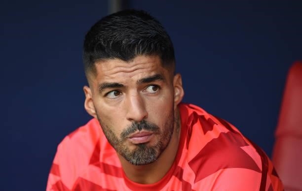 Luis Suarez of Atletico de Madrid looks on from the substitutes bench prior to the La Liga Santander match between Club Atletico de Madrid and Elche...