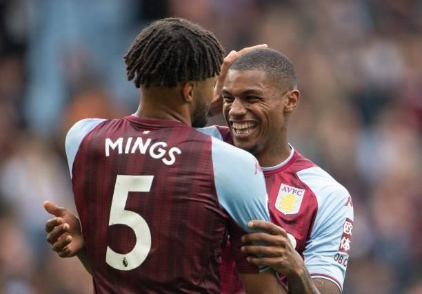 Tyrone Mings and Wesley Moraes of Aston Villa embrace at the end of the Premier League match between Aston Villa and Newcastle United at Villa Park...