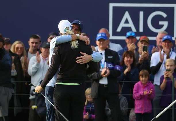 Anna Nordqvist of Sweden poses with husband, Kevin McAlpine, on the 18th green after winning the AIG Women's Open at Carnoustie Golf Links on August...