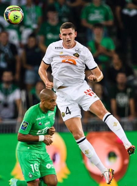 Sven Botman of Lille fights for the ball with Wahbi Khazri of Saint-Étienne during the Ligue 1 Uber Eats match between Saint Etienne and Lille at...