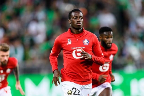 Timothy Weah of Lille warming up during the Ligue 1 Uber Eats match between Saint Etienne and Lille at Stade Geoffroy-Guichard on August 21, 2021 in...