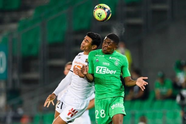 Benjamin Andre of Lille fights for the ball with Zaydou Youssouf of Saint-Étienne during the Ligue 1 Uber Eats match between Saint Etienne and Lille...