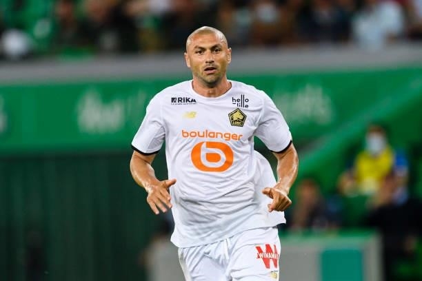 Burak Yilmaz of Lille in action during the Ligue 1 Uber Eats match between Saint Etienne and Lille at Stade Geoffroy-Guichard on August 21, 2021 in...