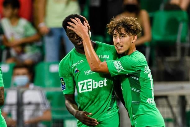 Saidow Sow of Saint-Étienne celebrating his goal with his teammate Adil Aouchiche of Saint-Étienne during the Ligue 1 Uber Eats match between Saint...