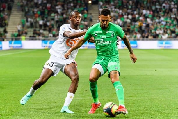 Tiago Djalo of Lille fights for the ball with Timothée Kolodziejczak of Saint-Étienne during the Ligue 1 Uber Eats match between Saint Etienne and...