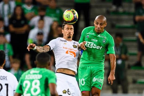 Jose Fonte of Lille fights for the ball with Wahbi Khazri of Saint-Étienne during the Ligue 1 Uber Eats match between Saint Etienne and Lille at...
