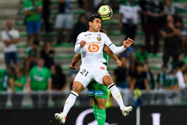 Benjamin Andre of Lille heads the ball during the Ligue 1 Uber Eats match between Saint Etienne and Lille at Stade Geoffroy-Guichard on August 21,...