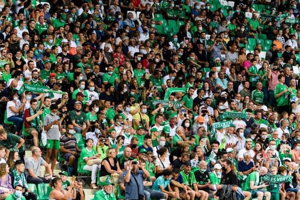 Saint Etienne supporters having fun during the Ligue 1 Uber Eats match between Saint Etienne and Lille at Stade Geoffroy-Guichard on August 21, 2021...