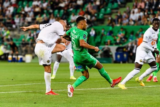 Burak Yilmaz of Lille attempts a kick for score his goal during the Ligue 1 Uber Eats match between Saint Etienne and Lille at Stade...