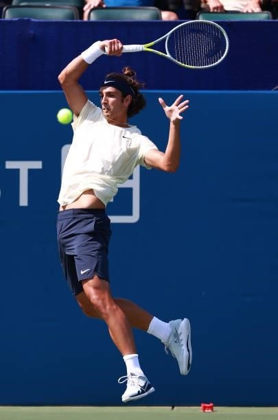 Lorenzo Musetti of Italy returns a shot to Federico Coria of Argentina during the Winston-Salem Open at Wake Forest Tennis Complex on August 23, 2021...