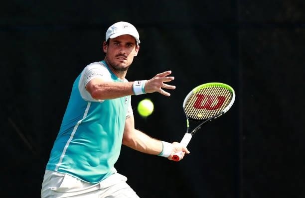 Guido Pella of Argentina returns a shot to Jordan Thompson of Australia during the Winston-Salem Open at Wake Forest Tennis Complex on August 23,...