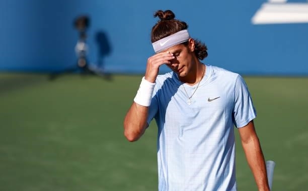 Lorenzo Musetti of Italy reacts to a missed shot during his loss to Federico Coria of Argentina on Day 3 of the Winston-Salem Open at Wake Forest...