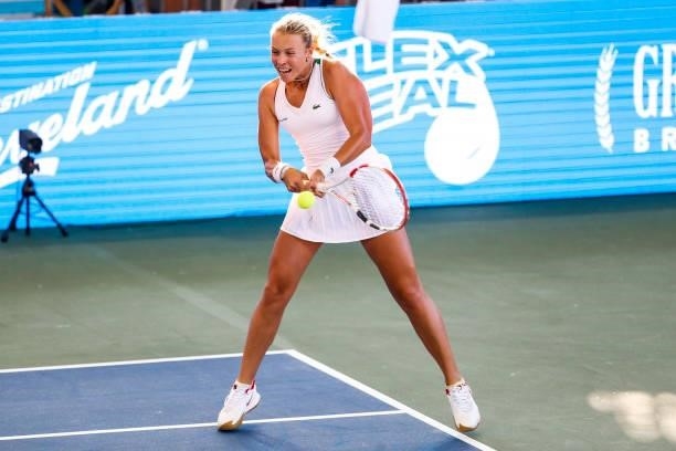 Anett Kontaveit of Estonia returns the ball to Lauren Davis of the United States during the second set of their match on Day 2 of the Cleveland...