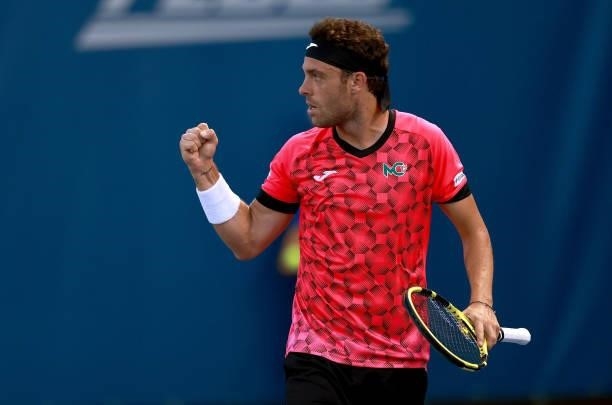 Marco Cecchinato of Italy reacts during his match against Dominik Koepfer of Germany on Day 3 of the Winston-Salem Open at Wake Forest Tennis Complex...