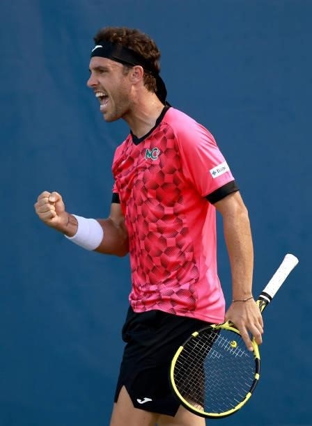 Marco Cecchinato of Italy reacts during his match against Dominik Koepfer of Germany on Day 3 of the Winston-Salem Open at Wake Forest Tennis Complex...