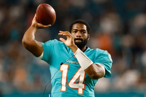Jacoby Brissett of the Miami Dolphins throws a pass during a preseason game against the Atlanta Falcons at Hard Rock Stadium on August 21, 2021 in...