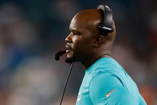 Head coach Brian Flores of the Miami Dolphins looks on during a preseason game against the Atlanta Falcons at Hard Rock Stadium on August 21, 2021 in...