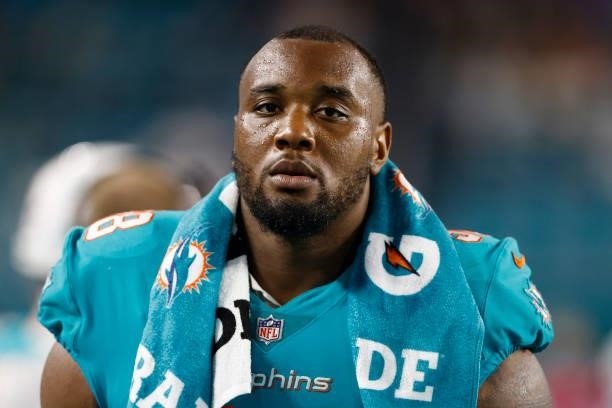 Raekwon Davis of the Miami Dolphins looks on against the Atlanta Falcons during a preseason game at Hard Rock Stadium on August 21, 2021 in Miami...