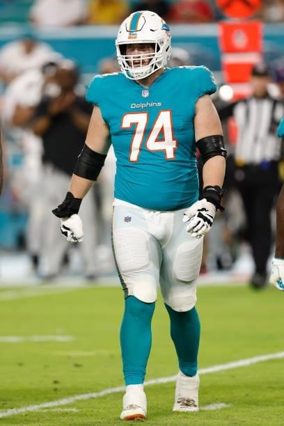 Liam Eichenberg of the Miami Dolphins looks on against the Atlanta Falcons during a preseason game at Hard Rock Stadium on August 21, 2021 in Miami...
