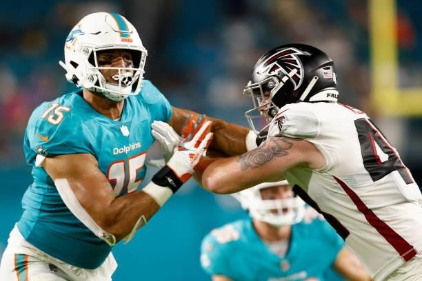 Jaelan Phillips of the Miami Dolphins in action against the Atlanta Falcons during a preseason game at Hard Rock Stadium on August 21, 2021 in Miami...
