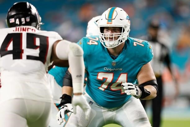 Liam Eichenberg of the Miami Dolphins in action against the Atlanta Falcons during a preseason game at Hard Rock Stadium on August 21, 2021 in Miami...
