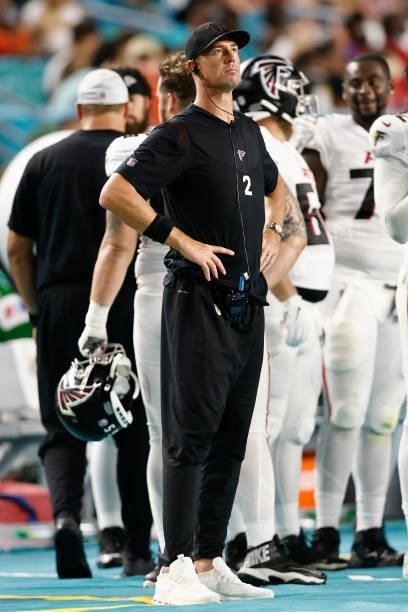 Matt Ryan of the Atlanta Falcons looks on against the Miami Dolphins during a preseason game at Hard Rock Stadium on August 21, 2021 in Miami...