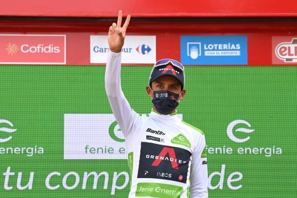 Egan Arley Bernal Gomez of Colombia and Team INEOS Grenadiers celebrates winning the White Best Young Rider Jersey on the podium ceremony after the...