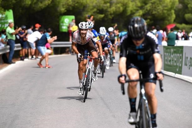 Clément Champoussin of France and AG2R Citröen Team and Michael Storer of Australia and Team DSM attack in the final climb Puerto de Almáchar during...