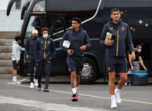 Conor Coady, Ki-Jana Hoever and Rayan Ait-Nouri of Wolverhampton Wanderers arrive at the stadium prior to the Carabao Cup Second Round match between...