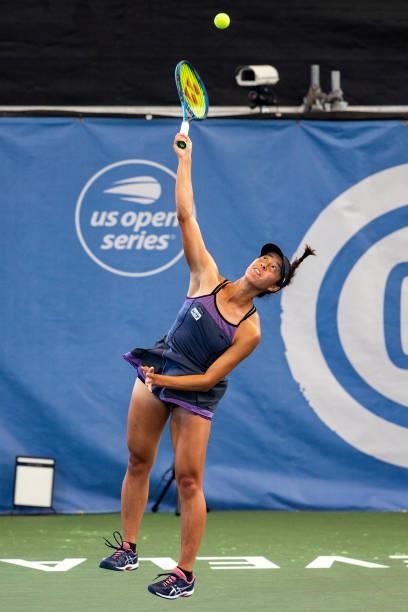 Ena Shibahara of Japan serves to Bethanie Mattek-Sands of USA during the first set of their match at Jacobs Pavilion on August 23, 2021 in CLEVELAND,...