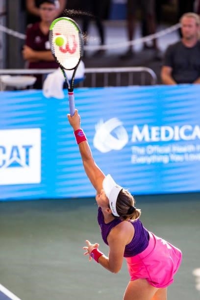 Lauren Davis of USA serves to Anett Kontaveit of Estonia during the first set of their match at Jacobs Pavilion on August 23, 2021 in CLEVELAND,...