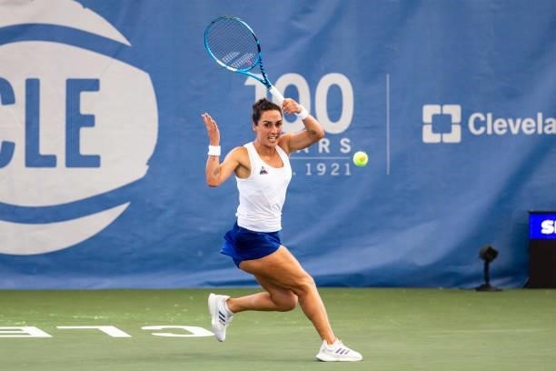 Martina Trevisan of Italy returns a serve during the second set of her match against Shuai Zhang of China at Jacobs Pavilion on August 23, 2021 in...