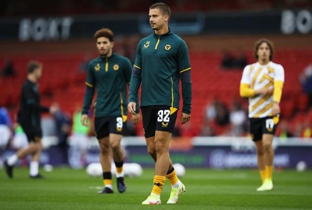 Leander Dendoncker of Wolverhampton Wanderers looks on as he warms up prior to the Carabao Cup Second Round match between Nottingham Forest and...