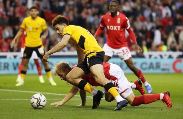 Rayan Ait-Nouri of Wolverhampton Wanderers is challenged by Fin Back of Nottingham Forest during the Carabao Cup Second Round match between...