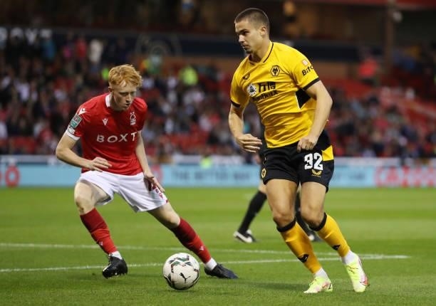 Leander Dendoncker of Wolverhampton Wanderers takes on Oliver Hammond of Nottingham Forest during the Carabao Cup Second Round match between...