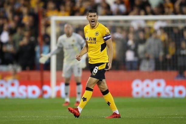 Conor Coady of Wolverhampton Wanderers gives their team instructions during the Carabao Cup Second Round match between Nottingham Forest and...