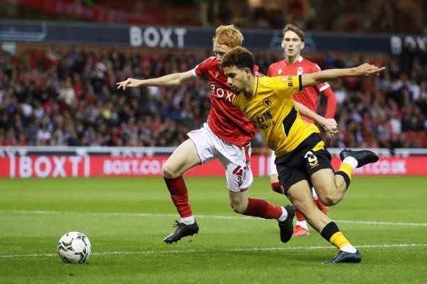 Rayan Ait-Nouri of Wolverhampton Wanderers is challenged by Oliver Hammond of Nottingham Forest during the Carabao Cup Second Round match between...